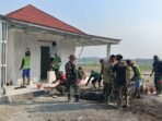 Kerjasama Satgas TMMD dan Komunitas Lokal dalam Pembangunan Fasilitas Umum