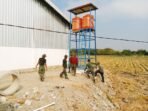 Progres Pemasangan Keramik Musala dan MCK oleh Satgas TMMD 129 Progres Pemasangan Keramik Musala dan MCK oleh Satgas TMMD 129