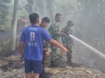 KOMITMEN BABINSA DAN TIM DAMKAR TANGGULANGI KEBAKARAN LAHAN DI PINELENG DUA KOMITMEN BABINSA DAN TIM DAMKAR TANGGULANGI KEBAKARAN LAHAN DI PINELENG DUA