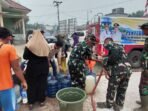 TNI dan Pemerintah Daerah Bersinergi dalam Penyediaan Air Bersih di Desa Gandang