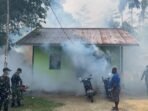 Aksi Fogging Prajurit YTP 859/RBK untuk Melawan Malaria