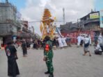 Peran Penting Babinsa dalam Prosesi Ngaben di Dauh Peken Peran Penting Babinsa dalam Prosesi Ngaben di Dauh Peken